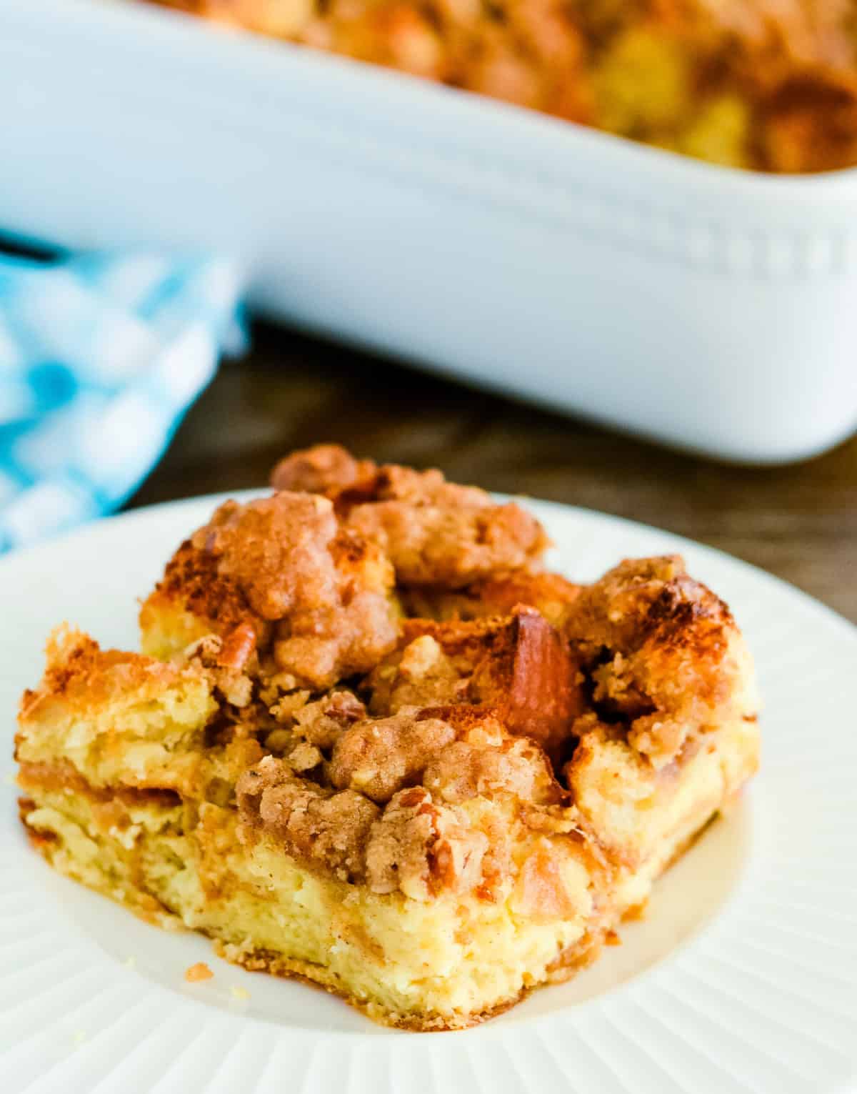overnight french toast bake on a plate with a pan in the background