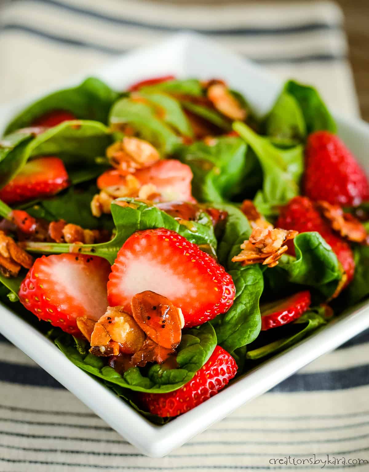 spinach strawberry salad with caramelized almonds and strawberry salad dressing