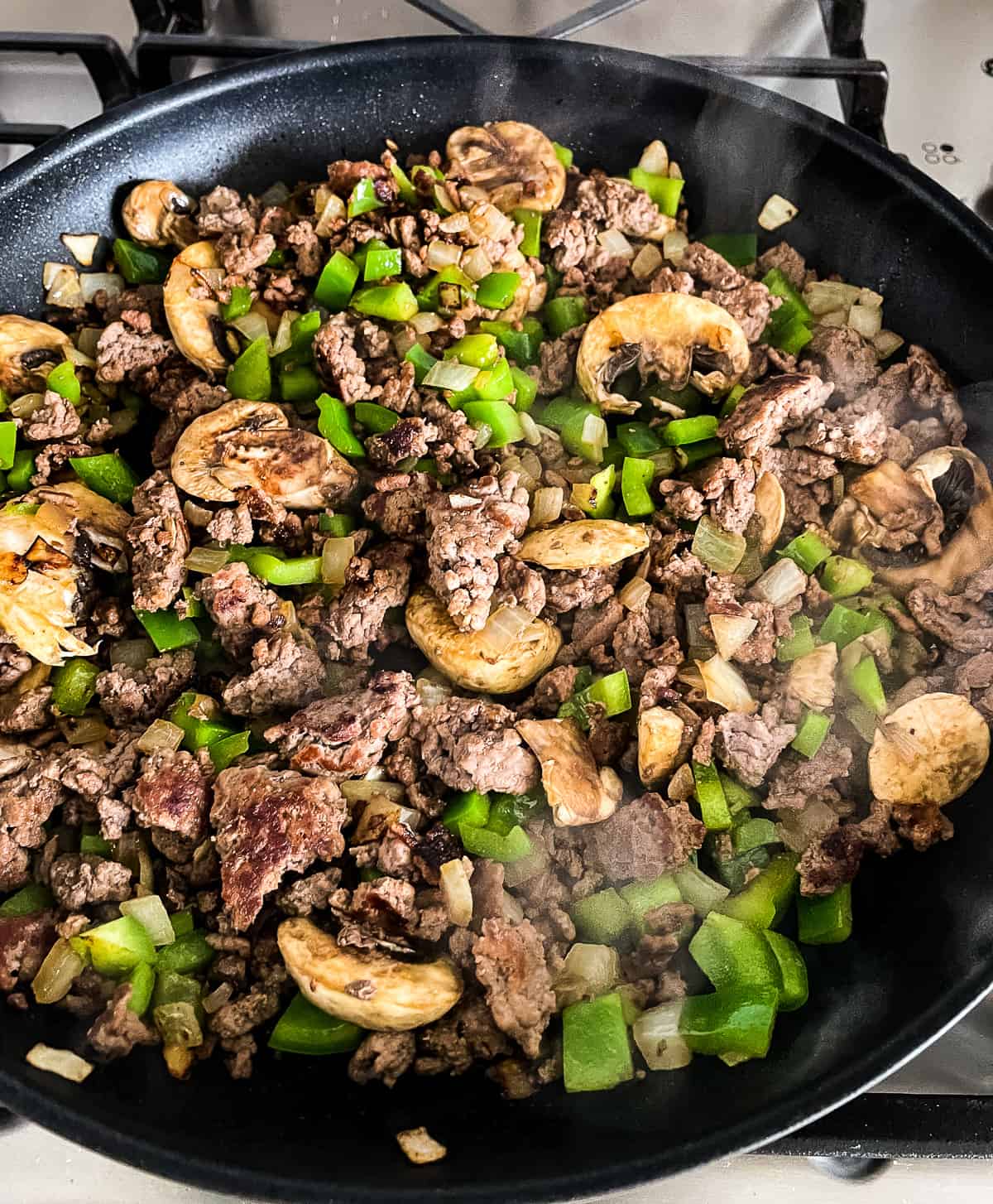 skillet with ground beef philly cheese steak