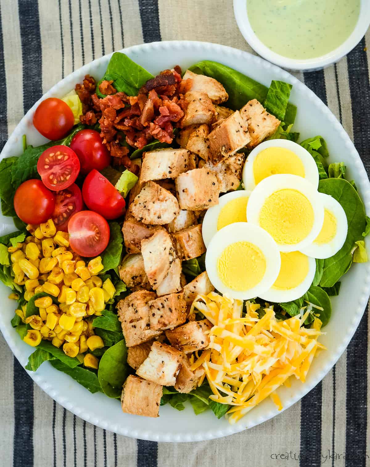 overhead shot of cobb salad with grilled chicken