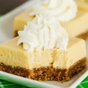 close up of key lime pie bar with a bite taken out of it