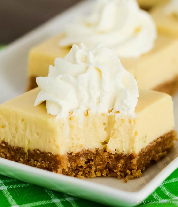 close up of key lime pie bar with a bite taken out of it