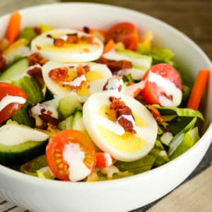 bowl of side salad with ranch dressing