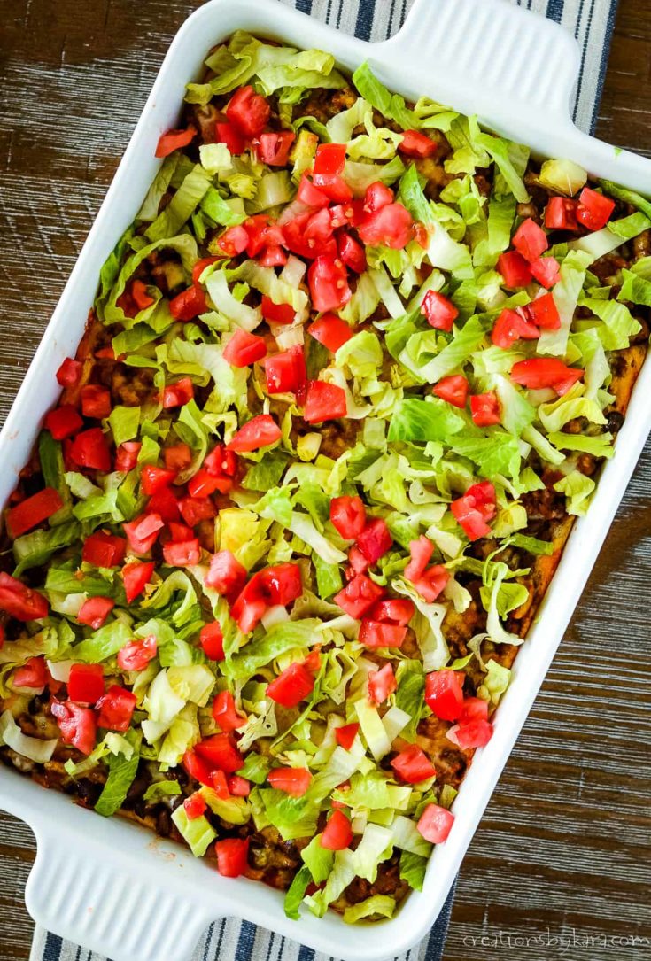 Crescent roll taco bake with lettuce and tomato
