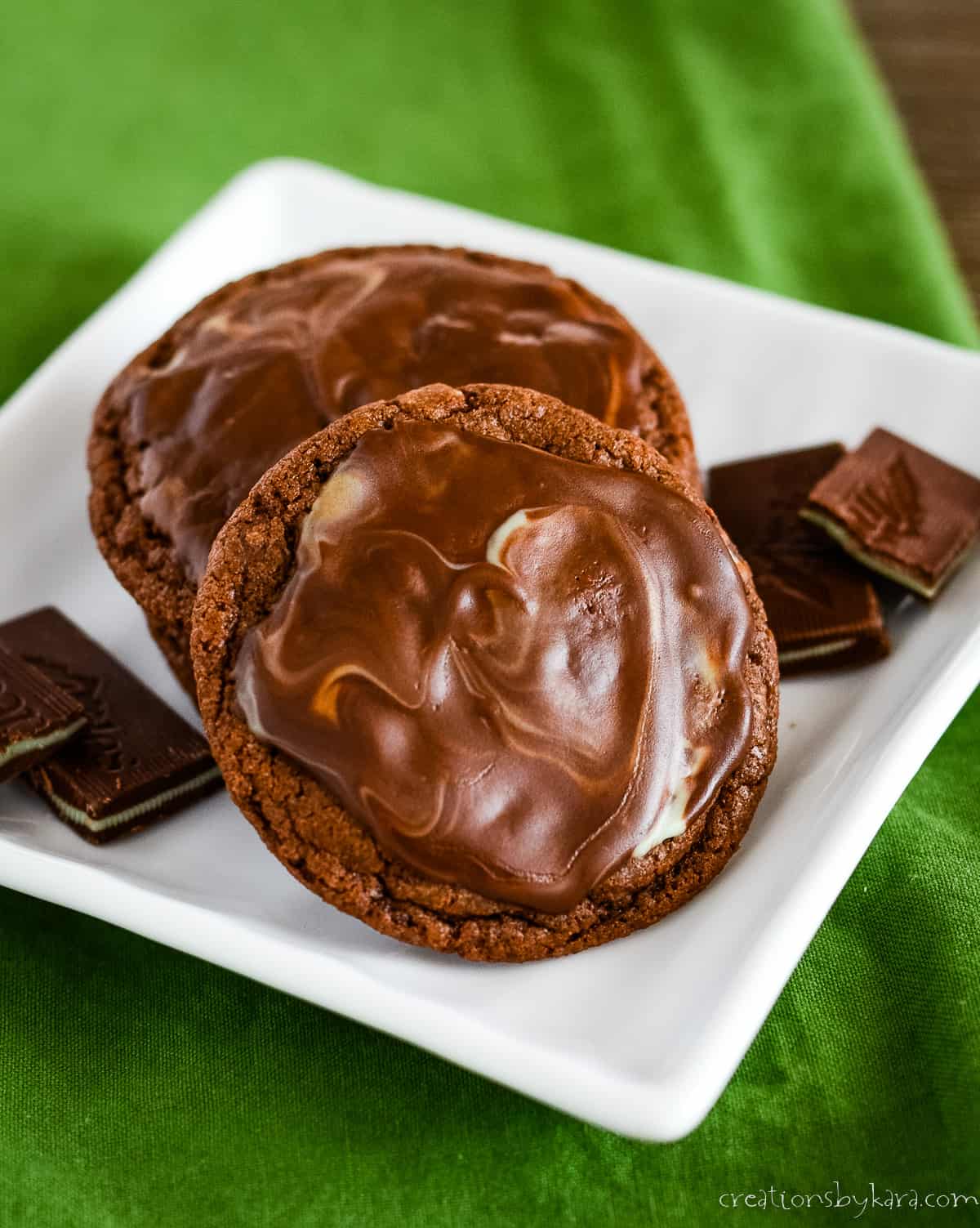 chocolate andes mint cookies on a plate with andes mints