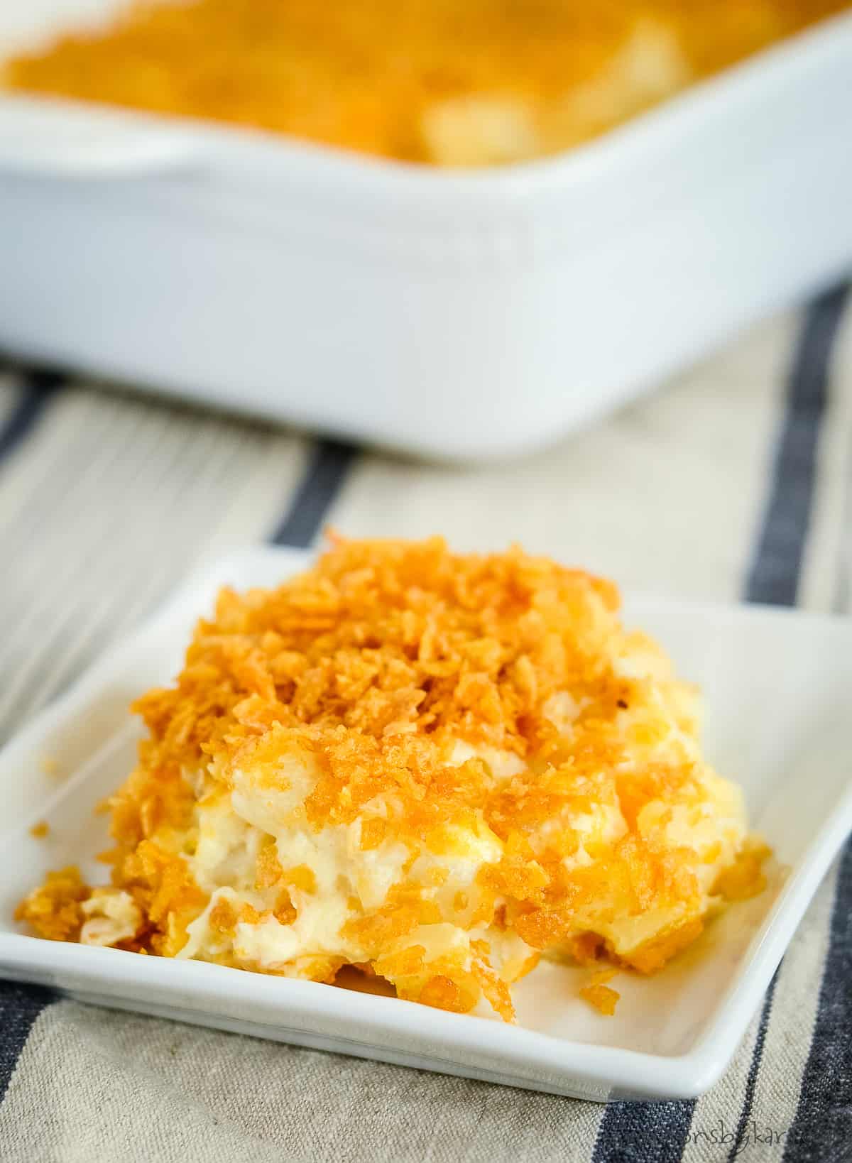 plate of cheesy hashbrown funeral potatoes