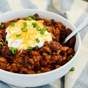 bowl of chili with a spoon in it