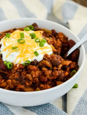 bowl of chili with a spoon in it