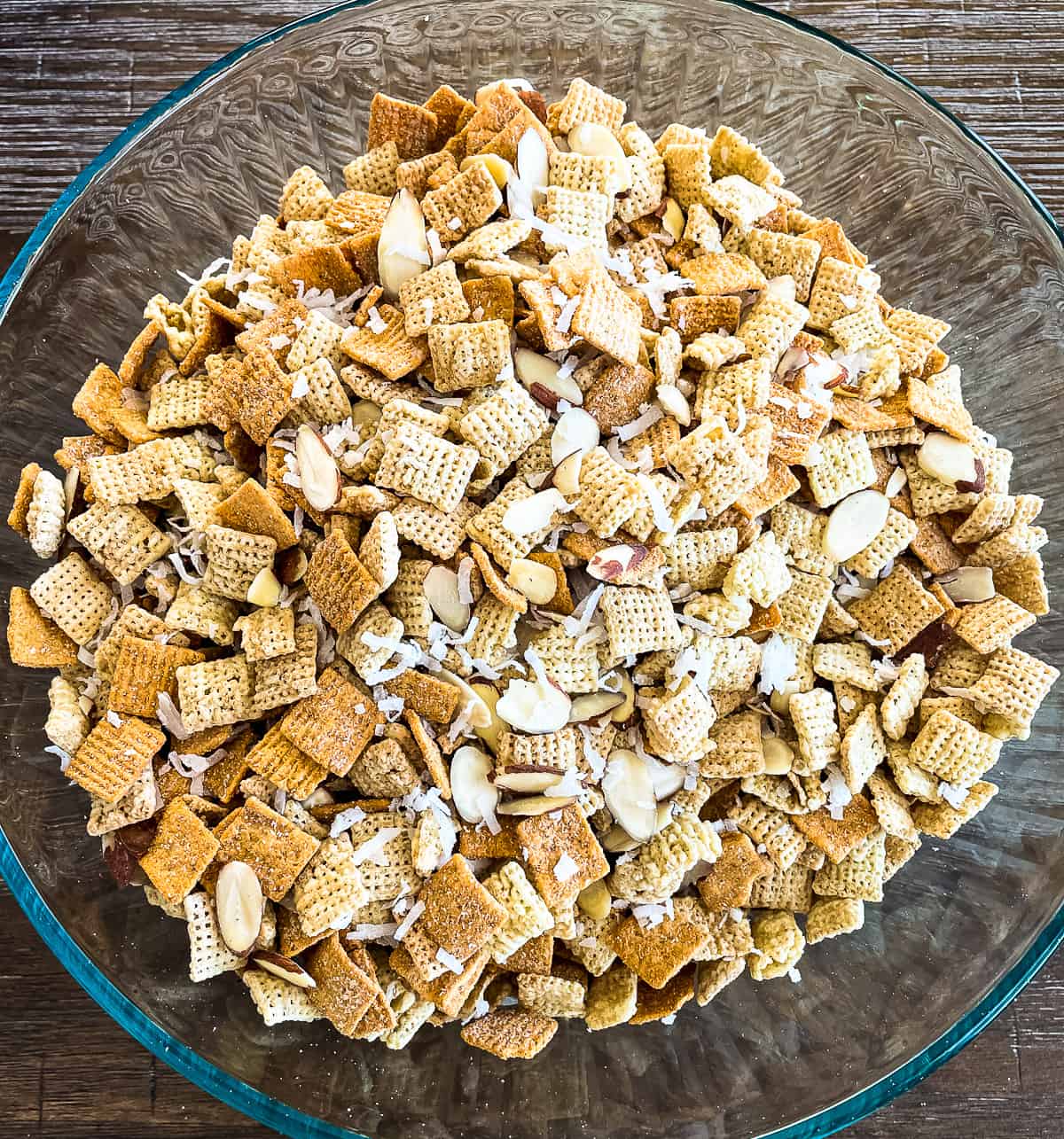 bowl of cereals, nuts, and coconut