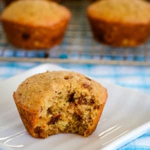 refrigerator bran muffins, one with a bite out of it