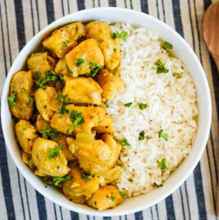 easy curry chicken garnished with chopped cilantro