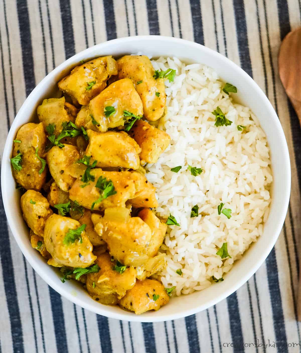 easy curry chicken garnished with chopped cilantro