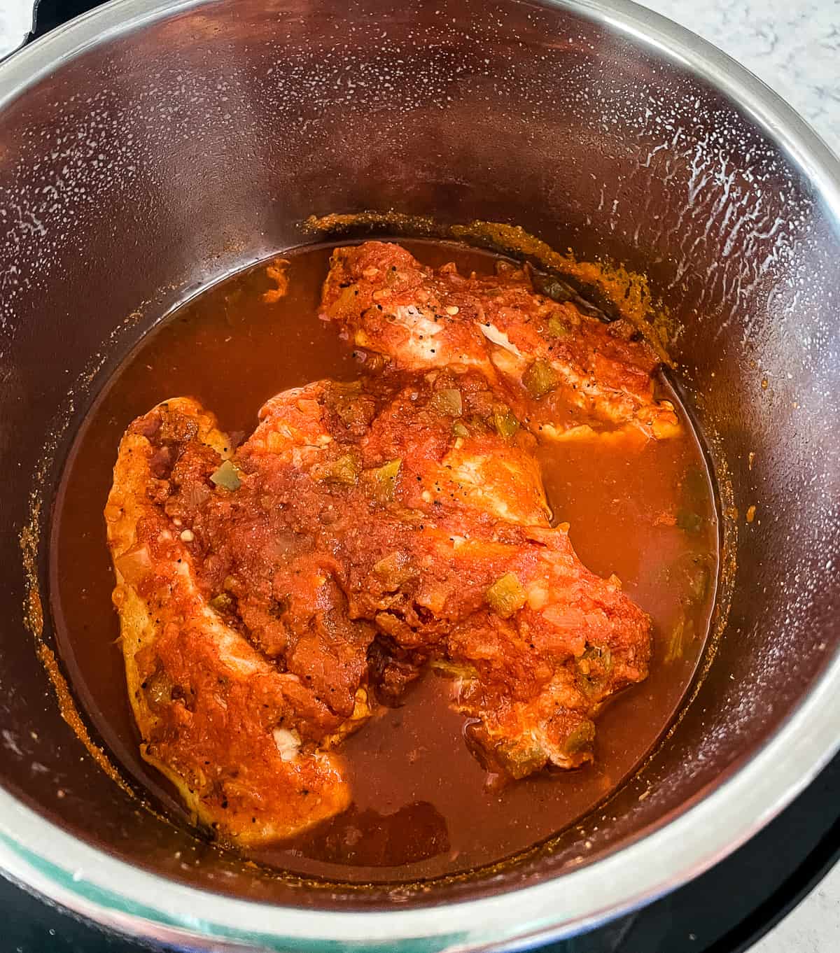 pot of salsa chicken for tacos