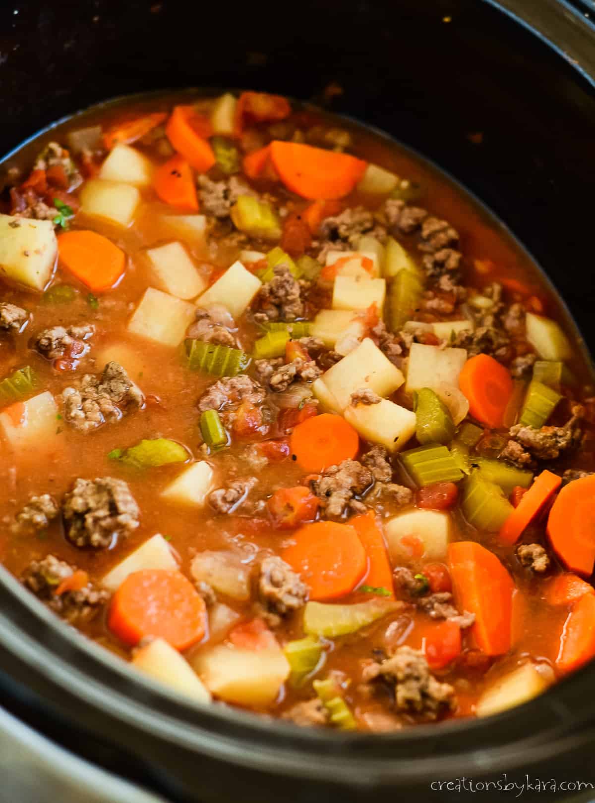 slow cooker full of ground beef stew