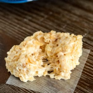 close up of gooey rice krispie treat with browned butter
