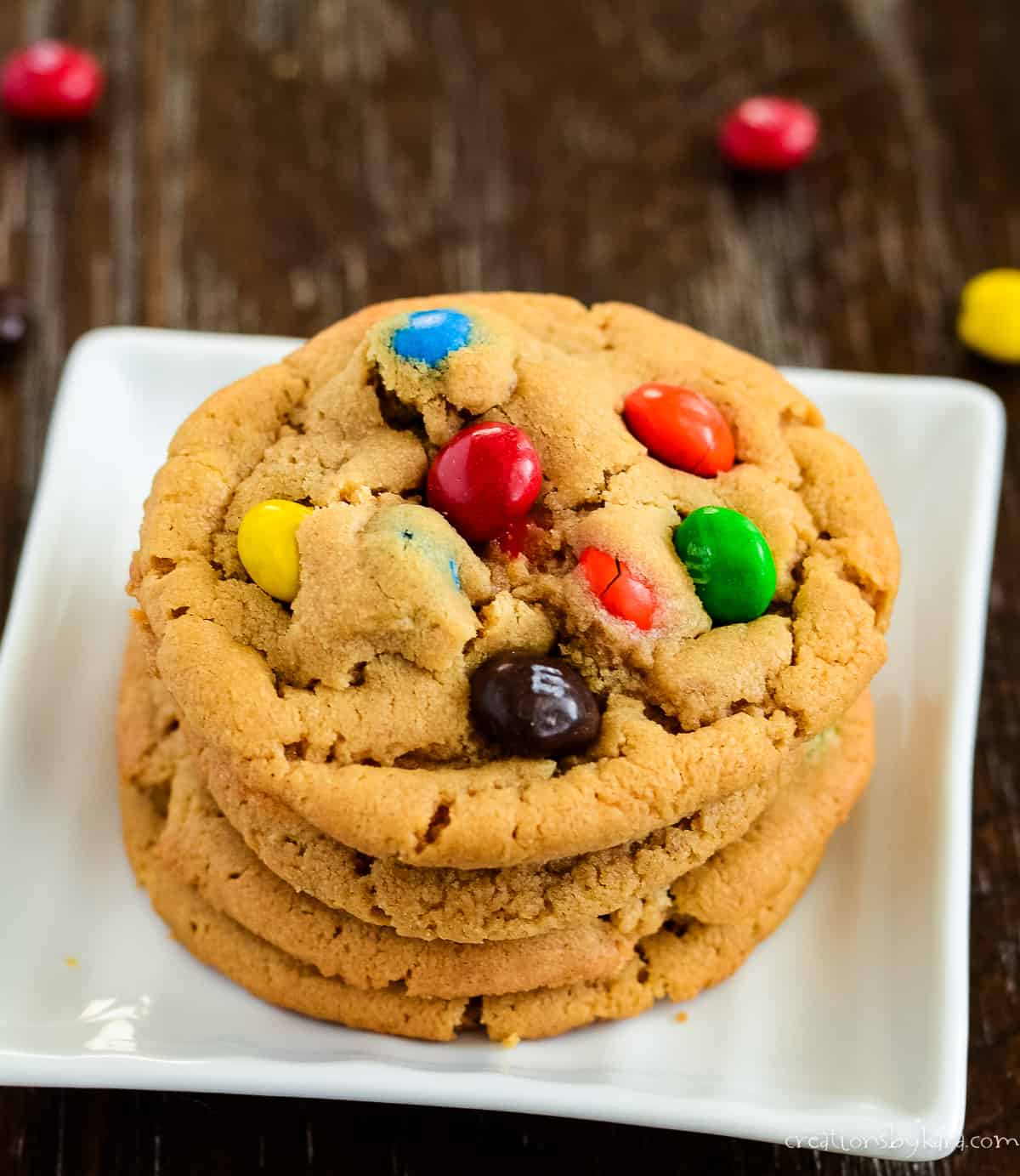 bakery style peanut m&m cookie recipe photo - cookies on a square white plate