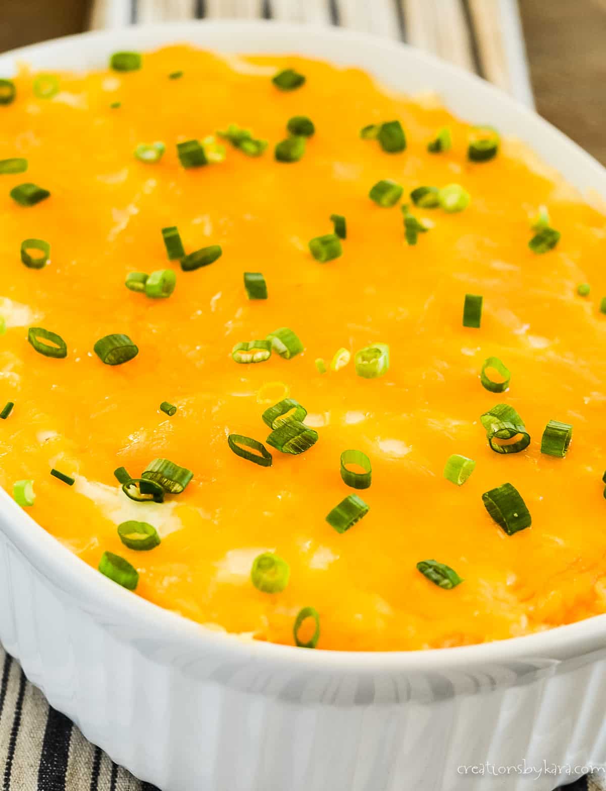 mexican shepherd's pie with melted cheese and green onions