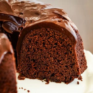 sliced chocolate brownie cake on a cake plate