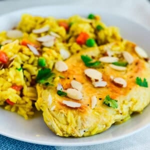 quick chicken curry rice on a white plate
