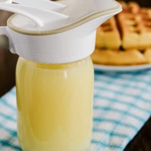 mason jar of homemade coconut syrup for waffles