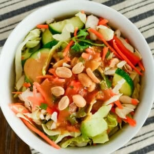 overhead shot of thai salad with creamy peanut dressing