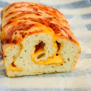 sliced loaf of cheese sourdough bread
