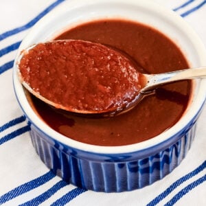 bowl of homemade chili sauce and a spoon