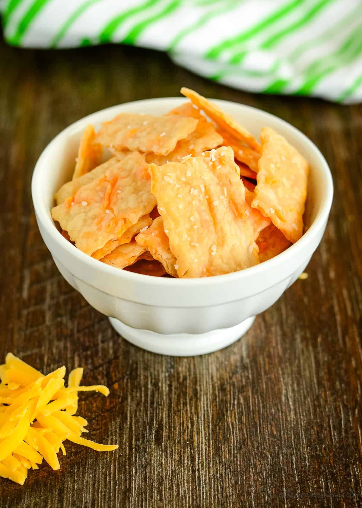 bowl of homemade sourdough crackers with cheddar