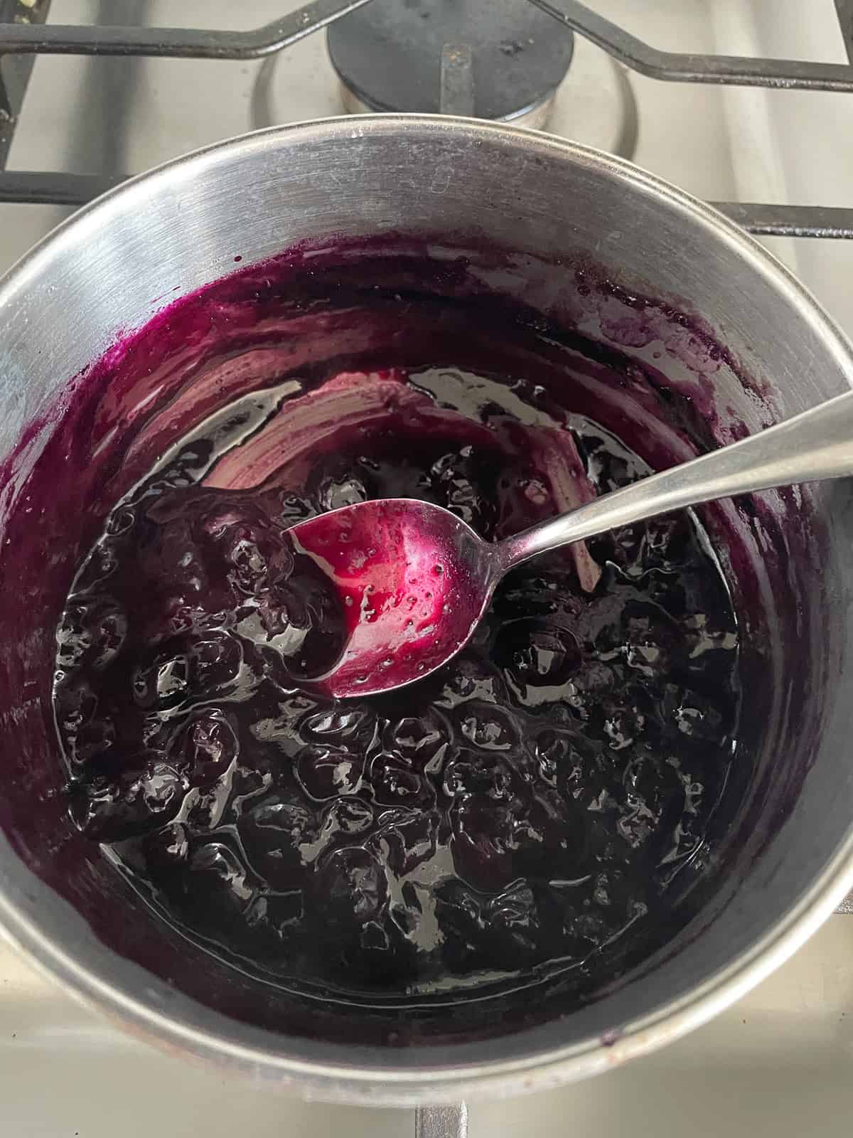 pan of blueberry compote for muffins