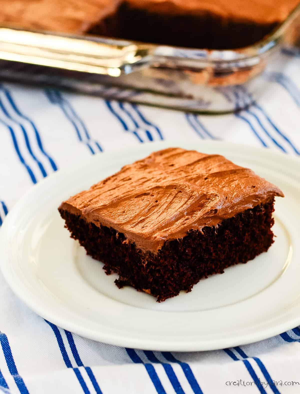 slice of old fashioned mayonnaise cake with chocolate frosting