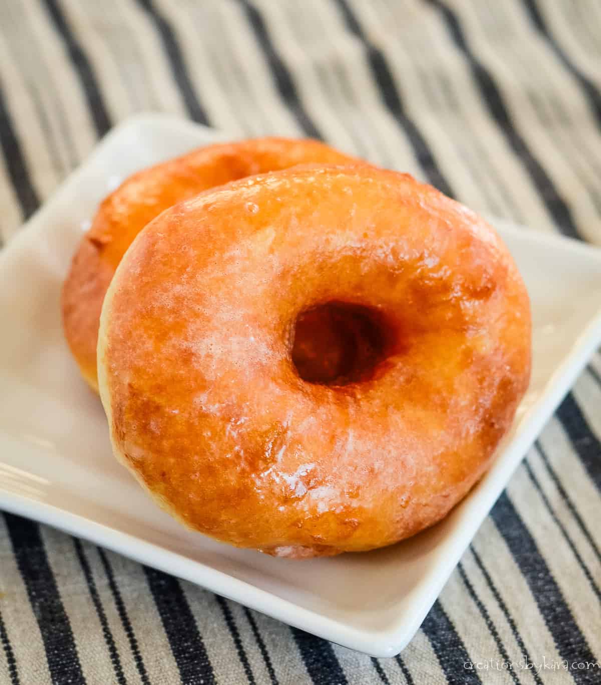 warm potato donuts on a plate