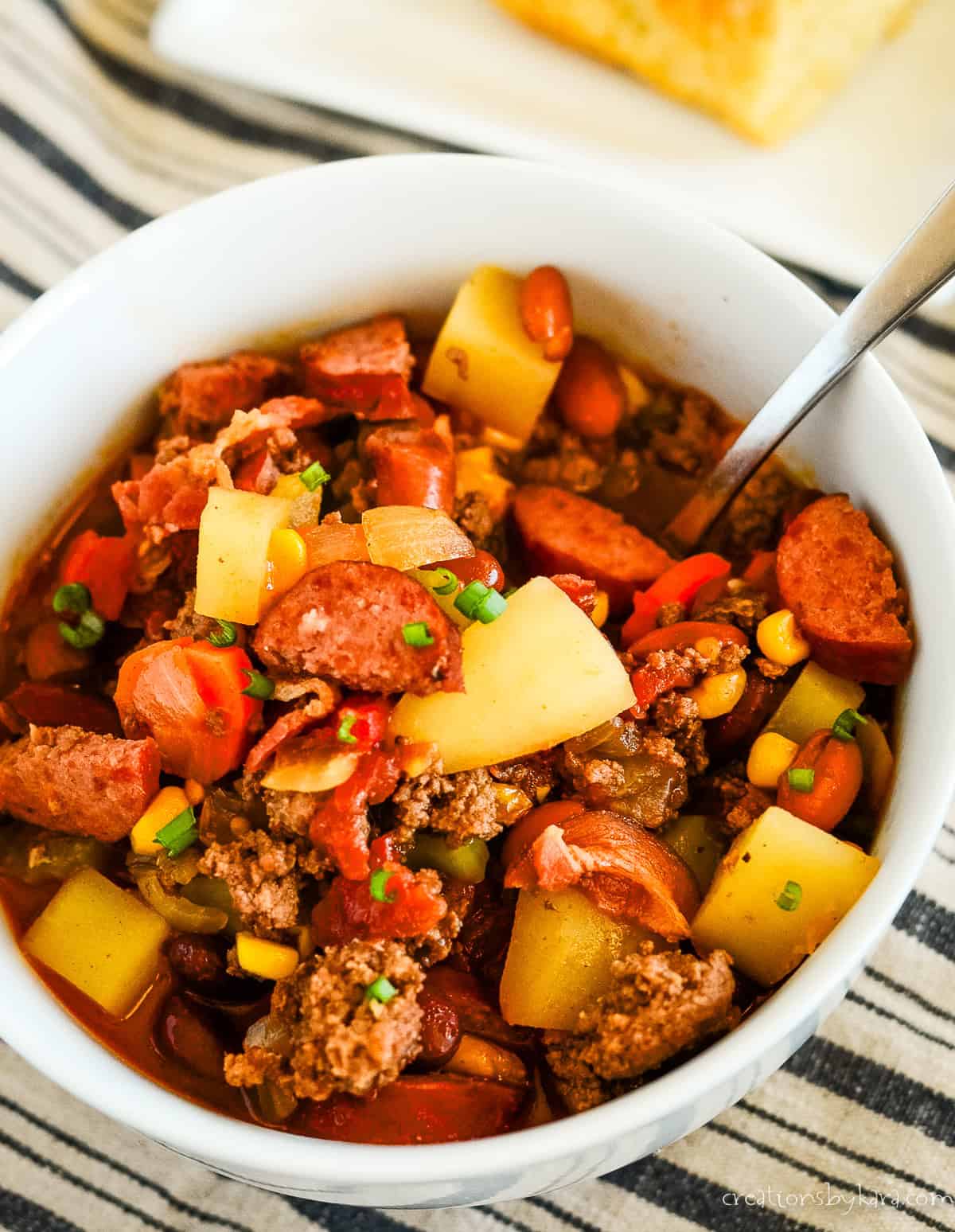 bowl of cowboy stew with a spoon
