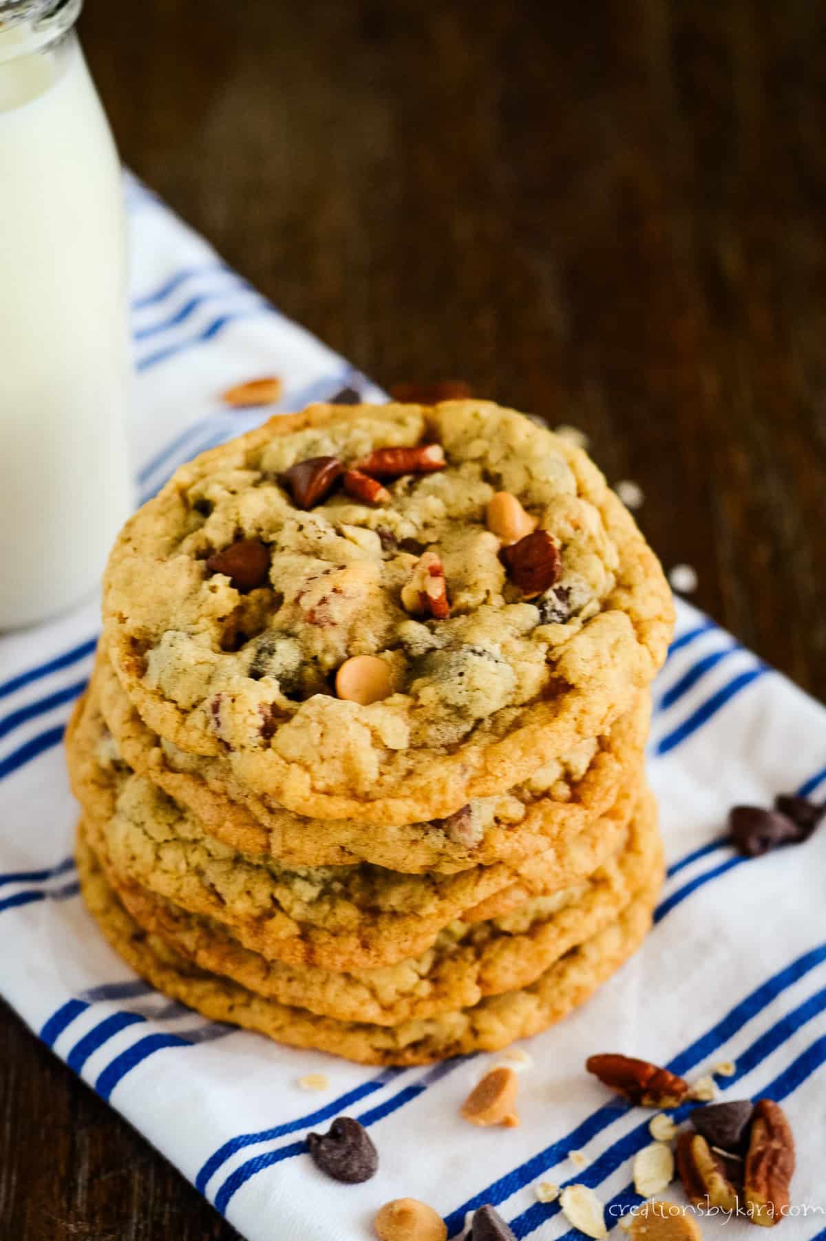 stack of silo cookies with a glass of milk in the background