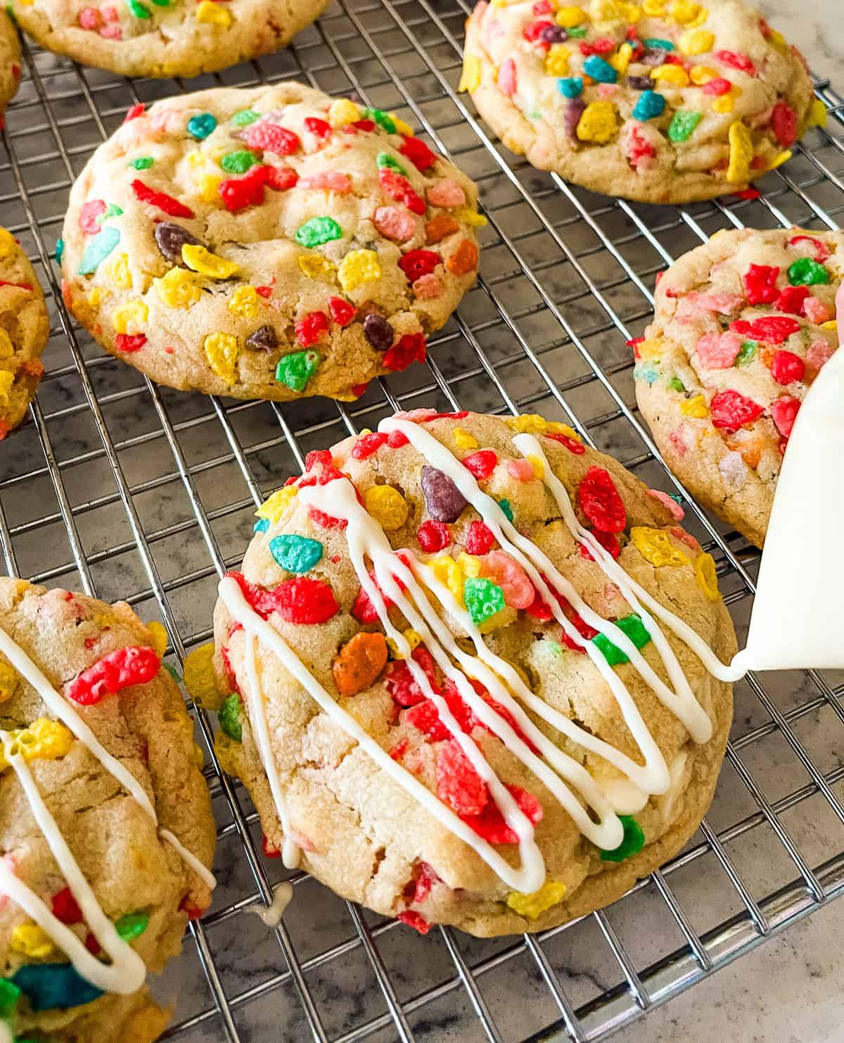 process shot- how to drizzle white chocolate over cookies