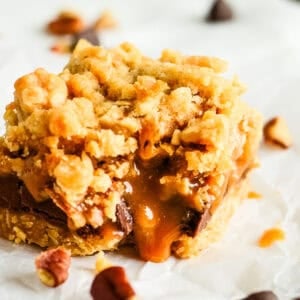 oatmeal carmelita with a bite taken out of it