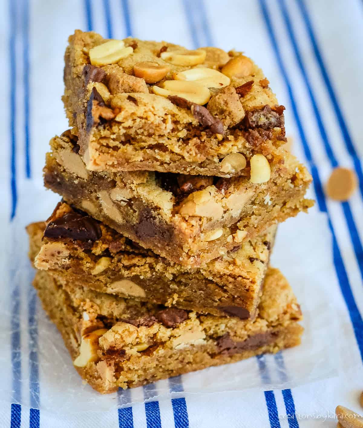 stack of peanut butter blondies on waxed paper