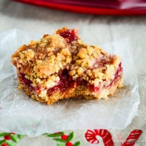 oatmeal raspberry bar on waxed paper