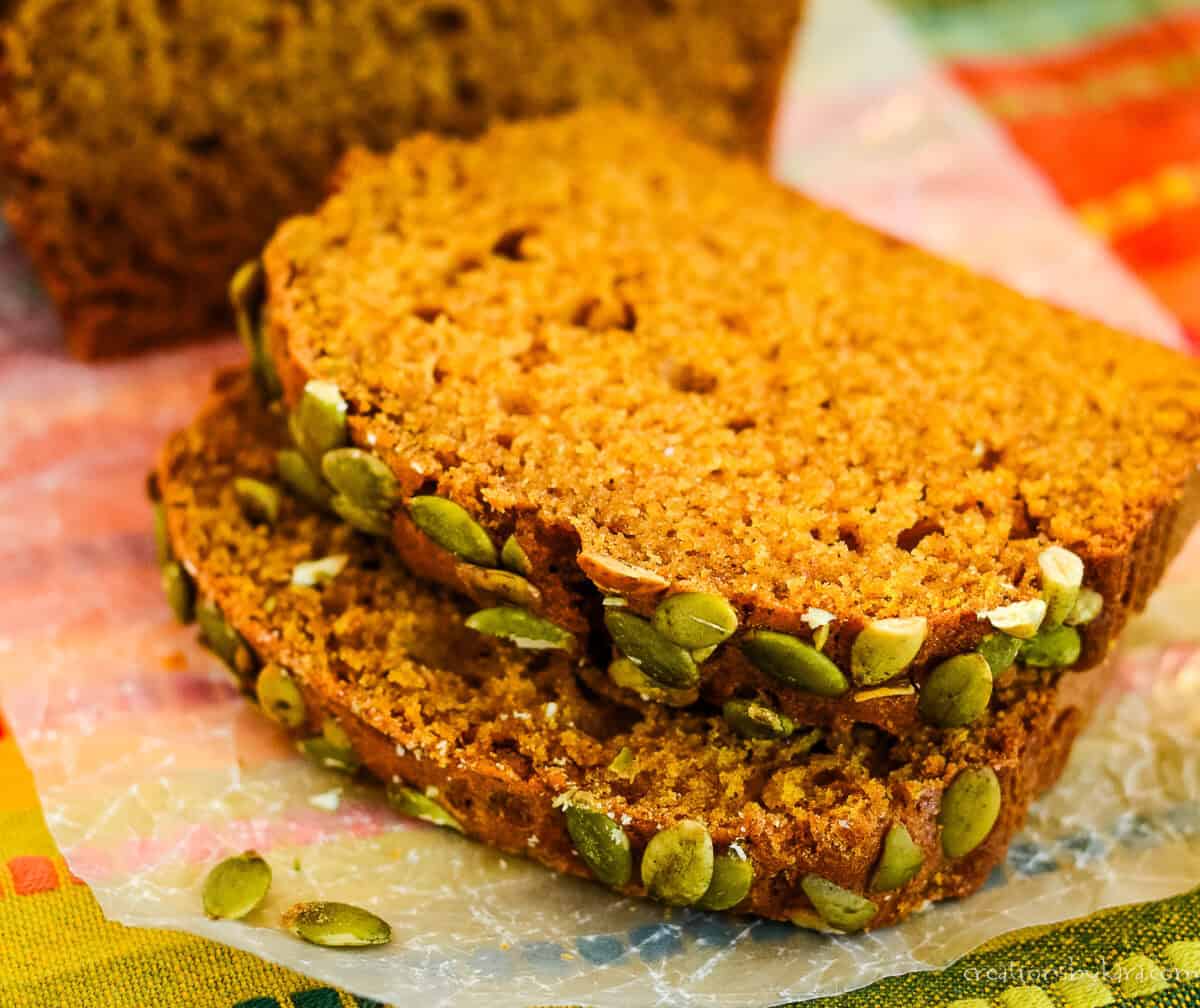 2 slices of copycat starbucks pumpkin bread on waxed paper