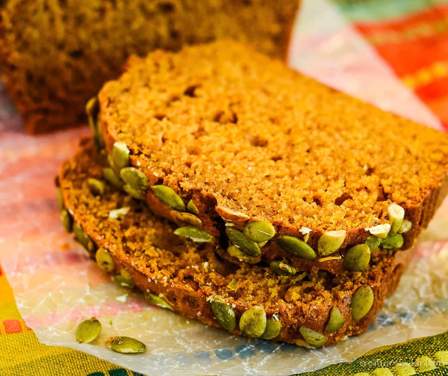 2 slices of copycat starbucks pumpkin bread on waxed paper